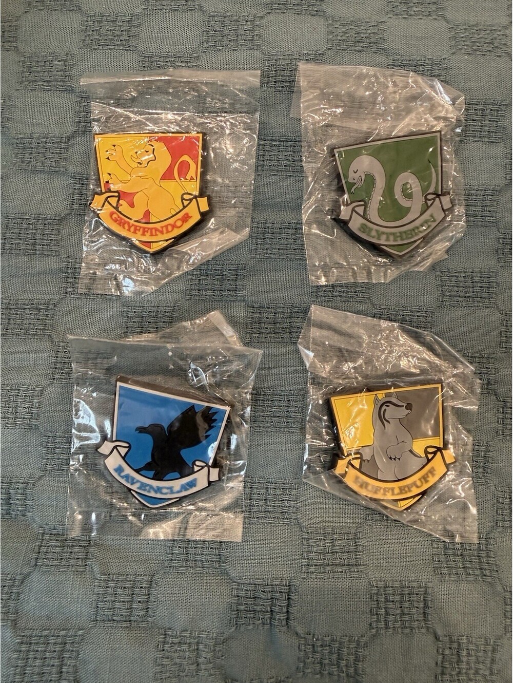 Harry Potter Hogwarts House Crest Pin Set 4-Piece New Sealed Rubber Gryffindor